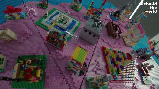 Video Reference: Green, Purple, World, Biome, Urban design, Toy block, Games, Magenta, Recreation, Lego