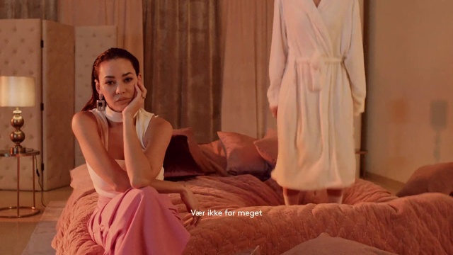 Video Reference: Dress, Comfort, Textile, Flash photography, Pink, Entertainment, Happy, Fashion design, Performing arts, Long hair