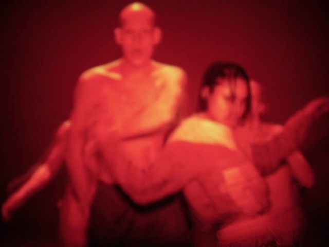 Video Reference: Flash photography, Entertainment, Shorts, Performing arts, T-shirt, Heat, Event, Magenta, Artist, Darkness