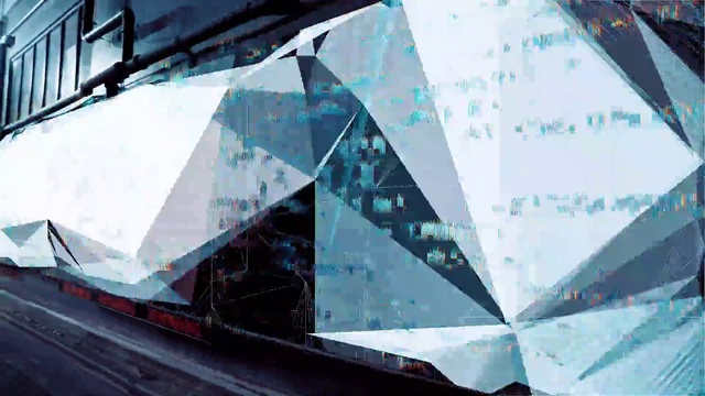Video Reference: Hood, Triangle, Urban design, Material property, Glass, City, Tints and shades, Art, Symmetry, Facade