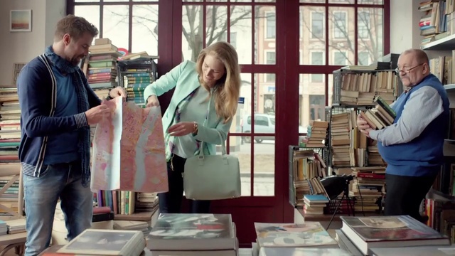 Video Reference: Trousers, Jeans, Outerwear, Interior design, Customer, Wood, Publication, T-shirt, Event, Table