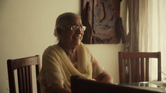 Video Reference: Glasses, Smile, Vision care, Comfort, Curtain, Eyewear, Wood, Event, Sitting, Conversation