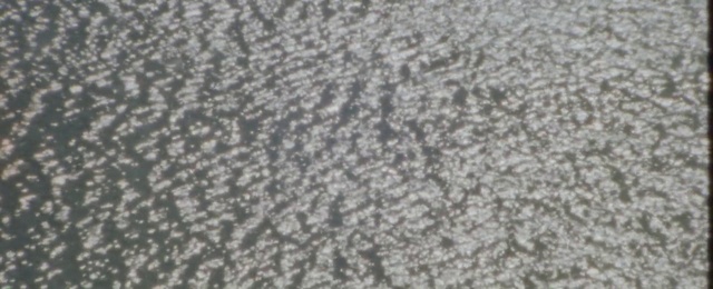 Video Reference: Grey, Asphalt, Automotive tire, Font, Pattern, Road surface, Woolen, Flooring, Metal, Carpet