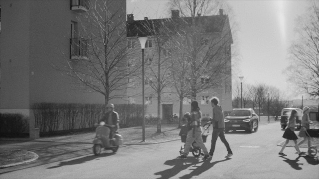 Video Reference: Tire, Land vehicle, Wheel, Car, Motor vehicle, Building, Vehicle, Black, Tree, Black-and-white