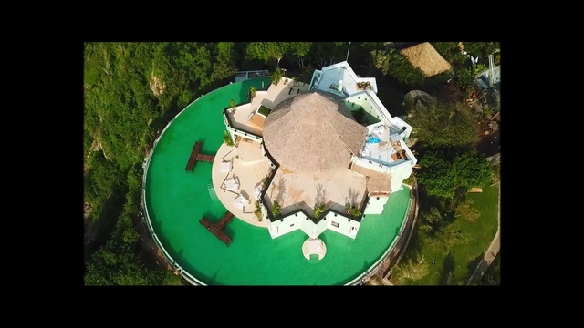 Video Reference: Plant, Table, Urban design, Grass, Art, Landscape, Circle, Font, Wood, Recreation