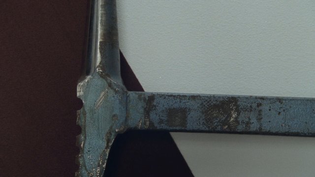 Video Reference: metal, rust, corrosion, close-up, macro, worn, industrial, texture, frame, tool, aged, surface, abstract, damage