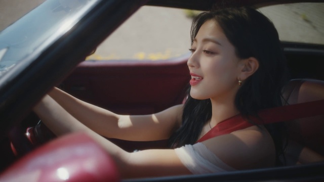 Video Reference: Vehicle, Car, Smile, Automotive design, Motor vehicle, Flash photography, Dress, Steering wheel, Vehicle door, Personal luxury car