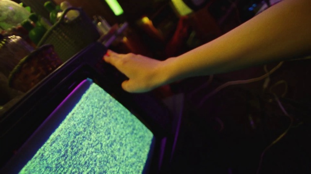 Video Reference: Purple, Gadget, Gesture, Finger, Computer keyboard, Leisure, Entertainment, Tints and shades, Display device, Glass