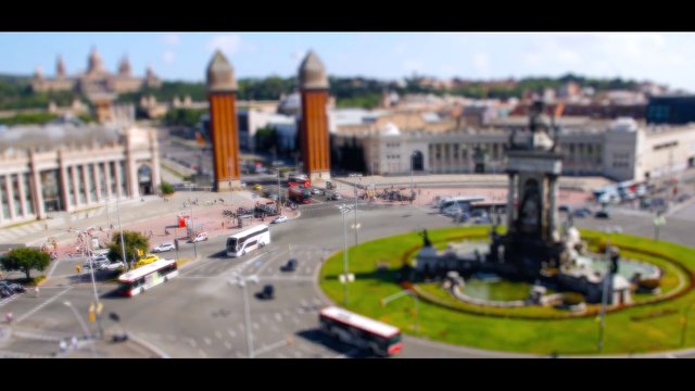Video Reference: aerial, city, roundabout, traffic, buses, monument, historic, urban, landmark, square, road, architecture, sunny, tilt-shift, tourism