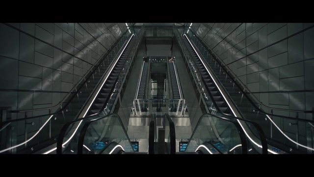 Video Reference: Building, Escalator, Stairs, Fixture, Skyscraper, Metropolitan area, Parallel, Symmetry, City, Tints and shades
