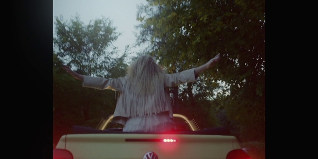 Video Reference: Tree, Gesture, Sky, Happy, Tints and shades, Automotive exterior, Motor vehicle, Fun, Event, Magenta