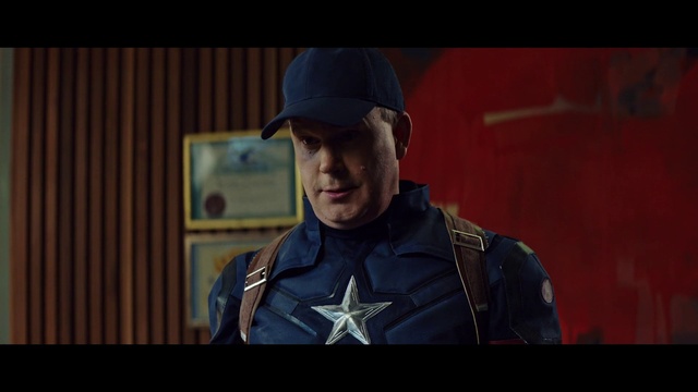 Video Reference: Flash photography, Cap, Headgear, Military person, Movie, Military uniform, Electric blue, Baseball cap, Entertainment, Official