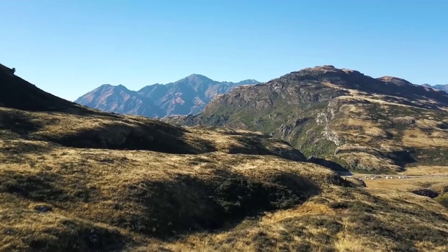 Video Reference: Sky, Mountain, Slope, Natural landscape, Terrain, Formation, Plant, Plain, Grassland, Landscape