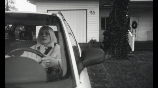 Video Reference: Window, Car, Plant, Vehicle, Motor vehicle, Automotive mirror, Automotive design, Vehicle door, Black-and-white, Smile