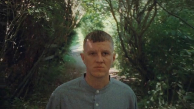 Video Reference: Plant, Jaw, Neck, Tree, Terrestrial plant, Grass, Happy, Forest, T-shirt, Woodland
