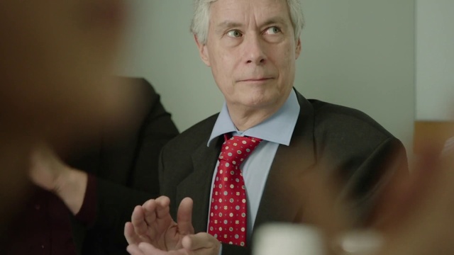 Video Reference: Dress shirt, Tie, Gesture, Collar, Thumb, Formal wear, White-collar worker, Event, Official, Wrinkle