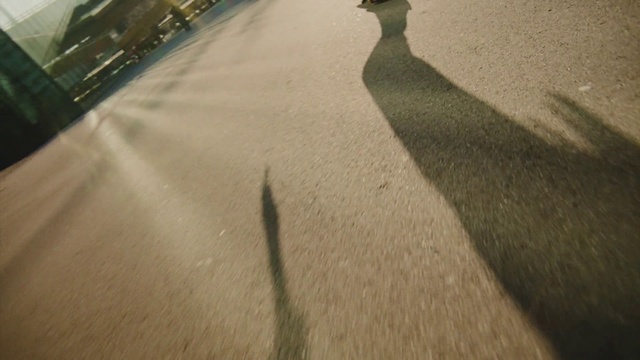 Video Reference: Automotive tire, Road surface, Asphalt, Wood, Tar, Thoroughfare, Floor, Landscape, Tints and shades, Flooring