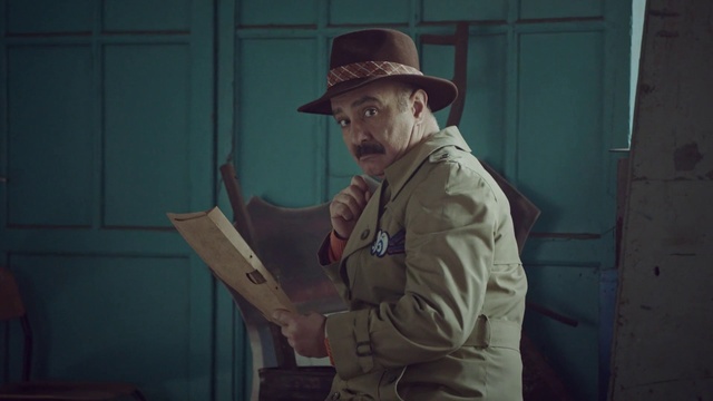 Video Reference: Hat, Sun hat, Collar, Facial hair, Sleeve, Moustache, Event, Cap, Fashion accessory, Artist