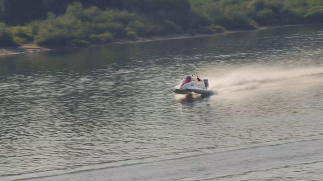 Video Reference: Water, Watercraft, Boat, Vehicle, Lake, Outdoor recreation, Tree, Recreation, Sports, Leisure