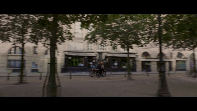 Video Reference: Building, Plant, Road surface, Window, Tree, Asphalt, Urban design, Atmospheric phenomenon, Thoroughfare, Sidewalk