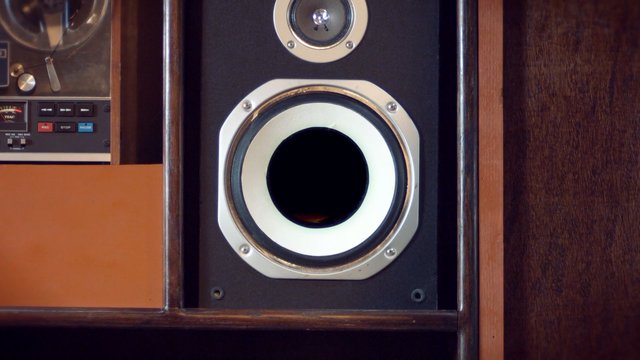 Video Reference: vintage speaker, wooden cabinet, woofer, tweeter, audio equipment, close-up, retro, electronics, sound system, speaker grille, control panel, indoor, brown wood, metal trim