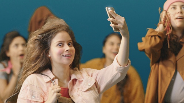 Video Reference: Hand, Arm, Smile, Happy, Gesture, Finger, Entertainment, Sign language, Event, Fun