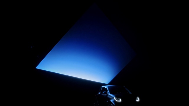 Video Reference: Hood, Automotive lighting, Triangle, Vehicle, Rectangle, Sky, Automotive design, Car, Pyramid, Automotive exterior