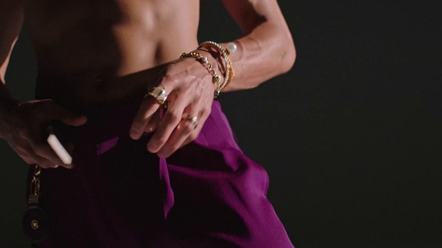 Video Reference: Purple, Sleeve, Dress, Gesture, Body jewelry, Finger, Waist, Wrist, Tie, Nail