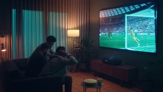 Video Reference: Furniture, Plant, Table, Lighting, Interior design, Couch, Houseplant, Comfort, Curtain, Television set