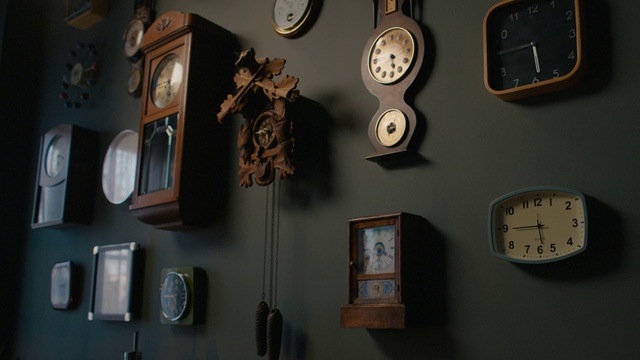 Video Reference: Brown, Wood, Clock, Font, Gas, Metal, Quartz clock, Fashion accessory, Room, Measuring instrument