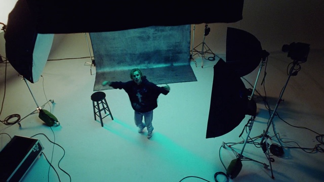 Video Reference: Tripod, Art, Cameras & optics, Film studio, Entertainment, Technology, Electric blue, Stage, Microphone stand, Event