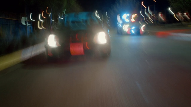 Video Reference: Car, Vehicle, Automotive lighting, Hood, Tire, Automotive tire, Automotive design, Motor vehicle, Road surface, Asphalt