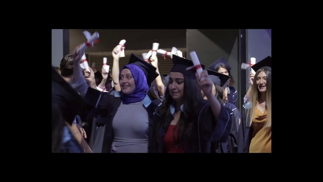 Video Reference: Smile, Mortarboard, Academic dress, Purple, Hat, Scholar, Graduation, Gesture, Headgear, Phd
