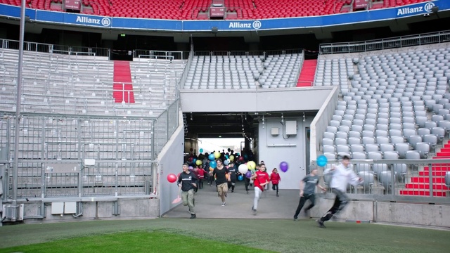 Video Reference: Infrastructure, Red, Leisure, People, Grass, Landmark, Stadium, Sports, Competition event, Championship