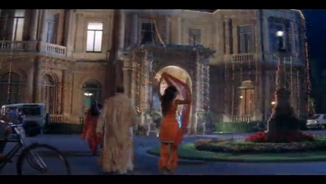 Video Reference: Window, Building, Wheel, Tire, Entertainment, Facade, Performing arts, Event, Bicycle wheel, Darkness