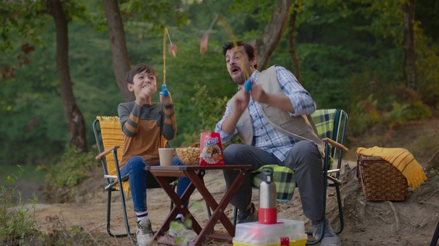 Video Reference: Plant, Shoe, Shorts, Leg, Chair, Tree, Outdoor furniture, Leisure, Sneakers, Grass
