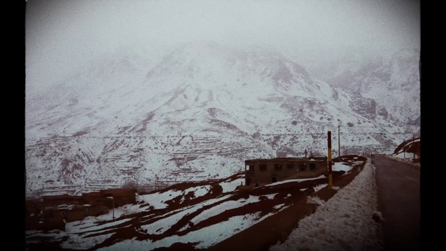 Video Reference: Sky, Mountain, Snow, Slope, Highland, Atmospheric phenomenon, Freezing, Glacial landform, Mountain range, Mountainous landforms