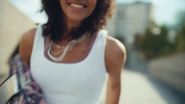Video Reference: Active tank, Arm, Shoulder, Smile, Undershirt, camisoles, Neck, Sleeve, Waist, Gesture