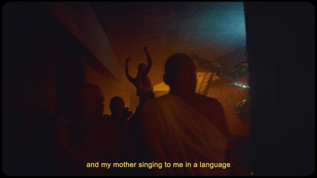 Video Reference: Gesture, Font, Event, Art, Happy, Religious item, Darkness, Entertainment, Room, Visual arts