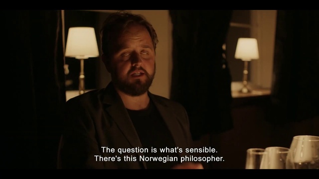 Video Reference: Flash photography, Beard, Lamp, Facial hair, Tints and shades, Tableware, Formal wear, Cup, Darkness, Event