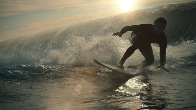 Video Reference: Water, Sky, Surfing, Surfboard, Sports equipment, People in nature, Surfing Equipment, Wind wave, Cloud, Recreation