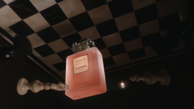 Video Reference: Perfume, Fluid, Glass bottle, Font, Bottle, Liquid, Drink, Event, Rectangle, Glass