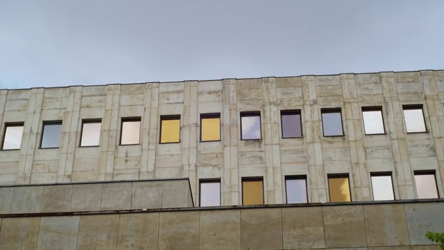 Video Reference: Building, Sky, Window, Rectangle, House, Urban design, Condominium, Tower block, Composite material, Font