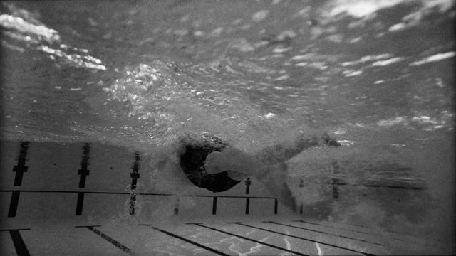 Video Reference: underwater, swimming pool, swimmer, bubbles, lane markings, aquatic, sports, training, freestyle, action, water, indoor pool