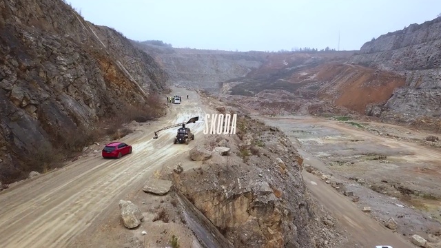 Video Reference: Sky, Vehicle, Tire, Wheel, Car, Mountain, Road surface, Slope, Asphalt, Bedrock