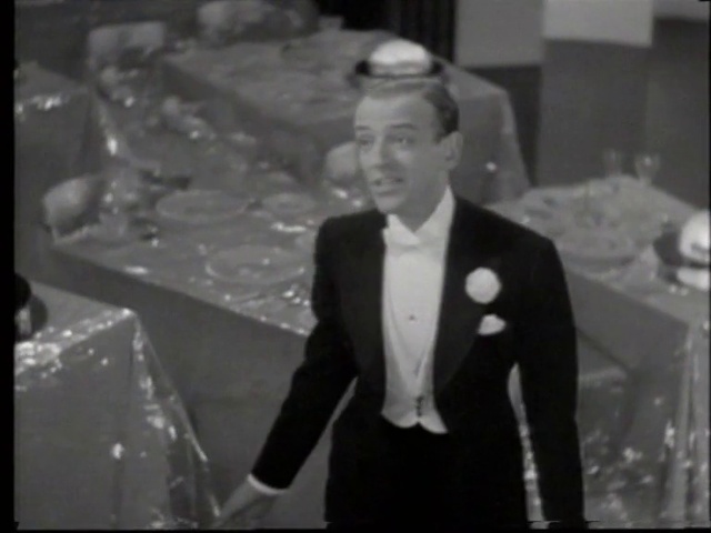 Video Reference: Suit trousers, Flash photography, Hat, Gesture, Black-and-white, Style, Tie, Collar, Suit, Blazer