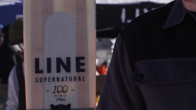 Video Reference: Sleeve, Gas, Font, Drink, Event, Street fashion, Advertising, Brand, Audio equipment, Glass bottle