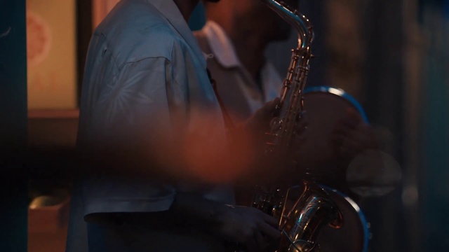 Video Reference: String instrument, Drum, Musical instrument, Guitar accessory, Musician, Saxophone, Musical instrument accessory, Cymbal, Saxophonist, Drumhead