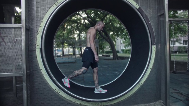 Video Reference: Window, Fixture, Infrastructure, Automotive tire, Standing, Flash photography, Shorts, Public space, Asphalt, Circle