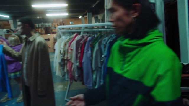 Video Reference: Sleeve, Clothes hanger, Sportswear, Customer, Retail, Fashion design, T-shirt, Shopping, Event, Street fashion